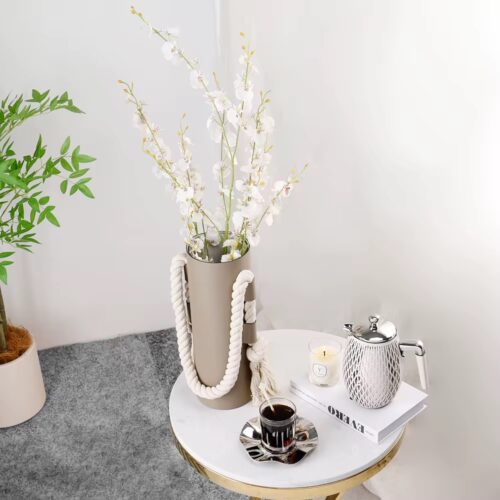 Leather flower vase with twig hanger