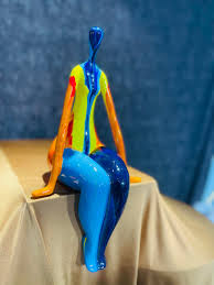 Splash lady sitting on edge