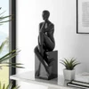 Metallic grey thinking woman