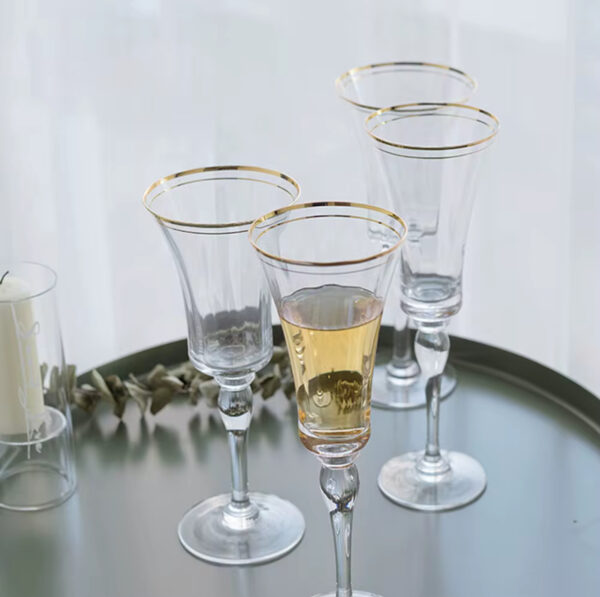 Gold rim champagne glass