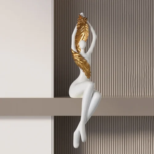 Lady sitting with gold leaf décor piece