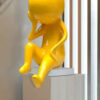 Yellow Thinking Figurine