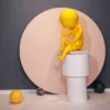 Yellow Thinking Figurine