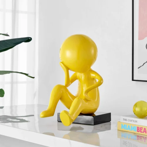 Yellow Thinking Figurine